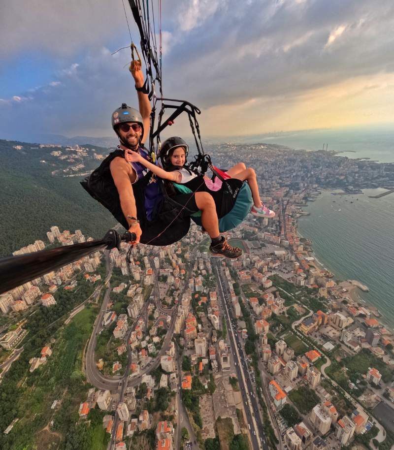 Tandem paragliding flight over Lebanon's coastline